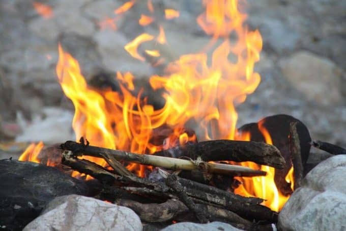 pile of burning sticks