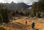 Backpacker overlooking scenic national park landscape