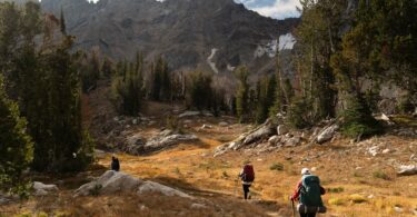 Backpacker overlooking scenic national park landscape
