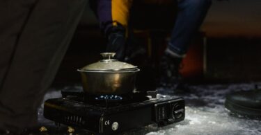 Backpacking meal prep with dehydrated food and camping stove