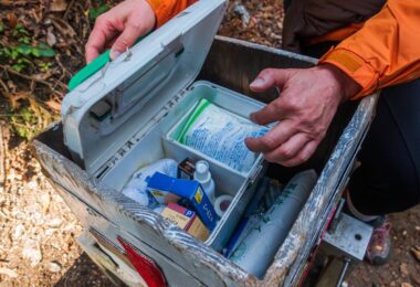 Hiker prepared with safety gear in mountain wilderness
