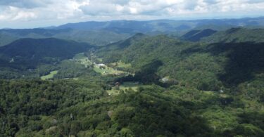 Aerial view of lush green Appalachian mountains and valleys in Tennessee.